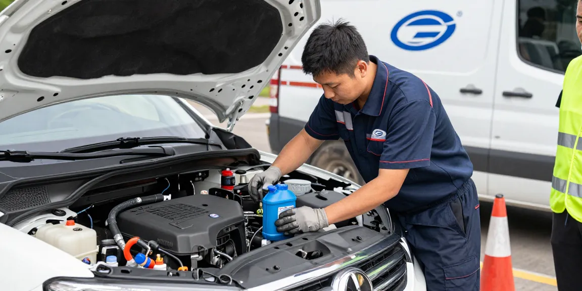 Technician draining Adblue in diesel car during roadside service.