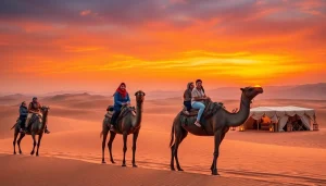 Agafay desert camel ride and dinner with a show at sunset, featuring tourists on camels in a vibrant desert landscape.